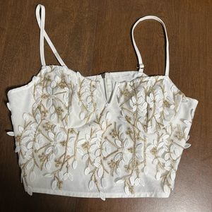 Large white crop top.